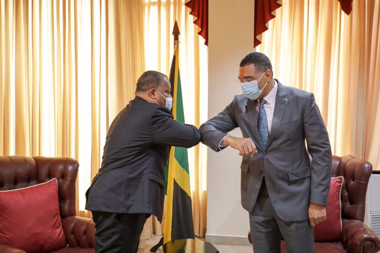 Resident Coordinator Garry Conille greets the Prime Minister of Jamaica, The Most Honourable Andrew Holness. 