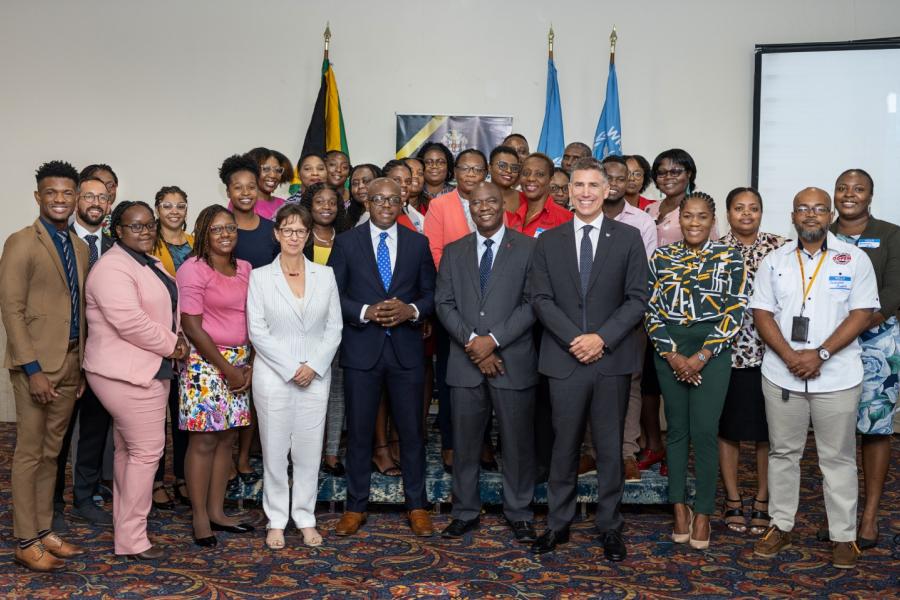 Minister of Labour and Social Security Pearnel Charles Jr join Resident Coordinator ai Richard Amenya and other members of the UNCT on the heels of the WFP's signature Shock-Responsive Social Protection Training