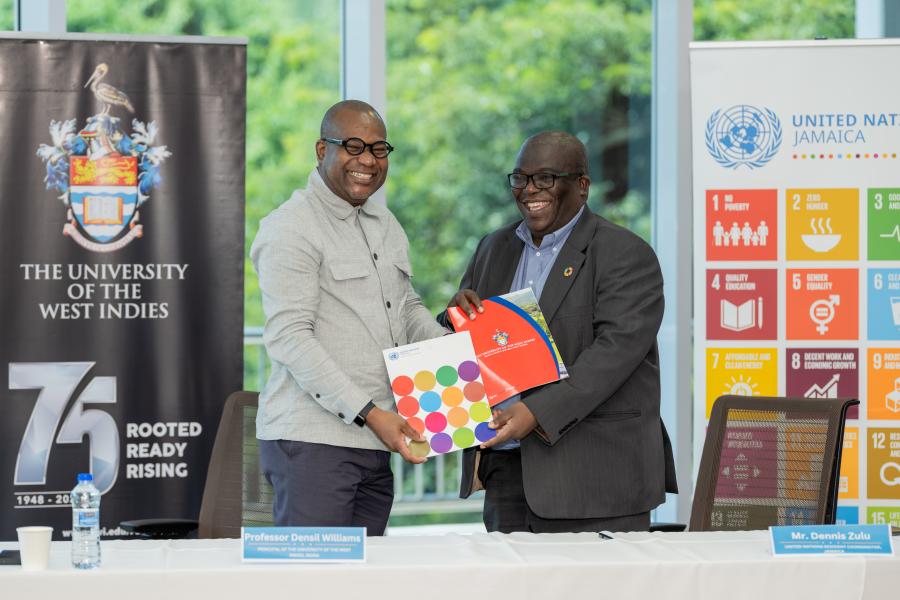 UN Inks New Partnership with the University of the West Indies Professor Densil A. Williams, Principal, UWI Mona (L) and Mr. Dennis Zulu UN Resident Coordinator (R)