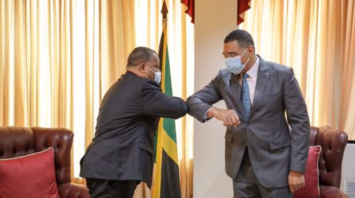 Resident Coordinator Garry Conille greets the Prime Minister of Jamaica, The Most Honourable Andrew Holness. 